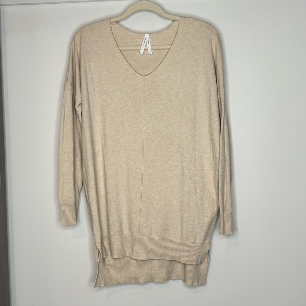 Cream v neck tunic Size M/L